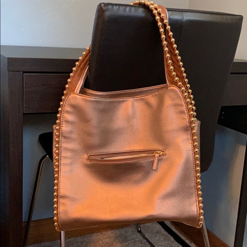 Bronze gold bag is so pretty!